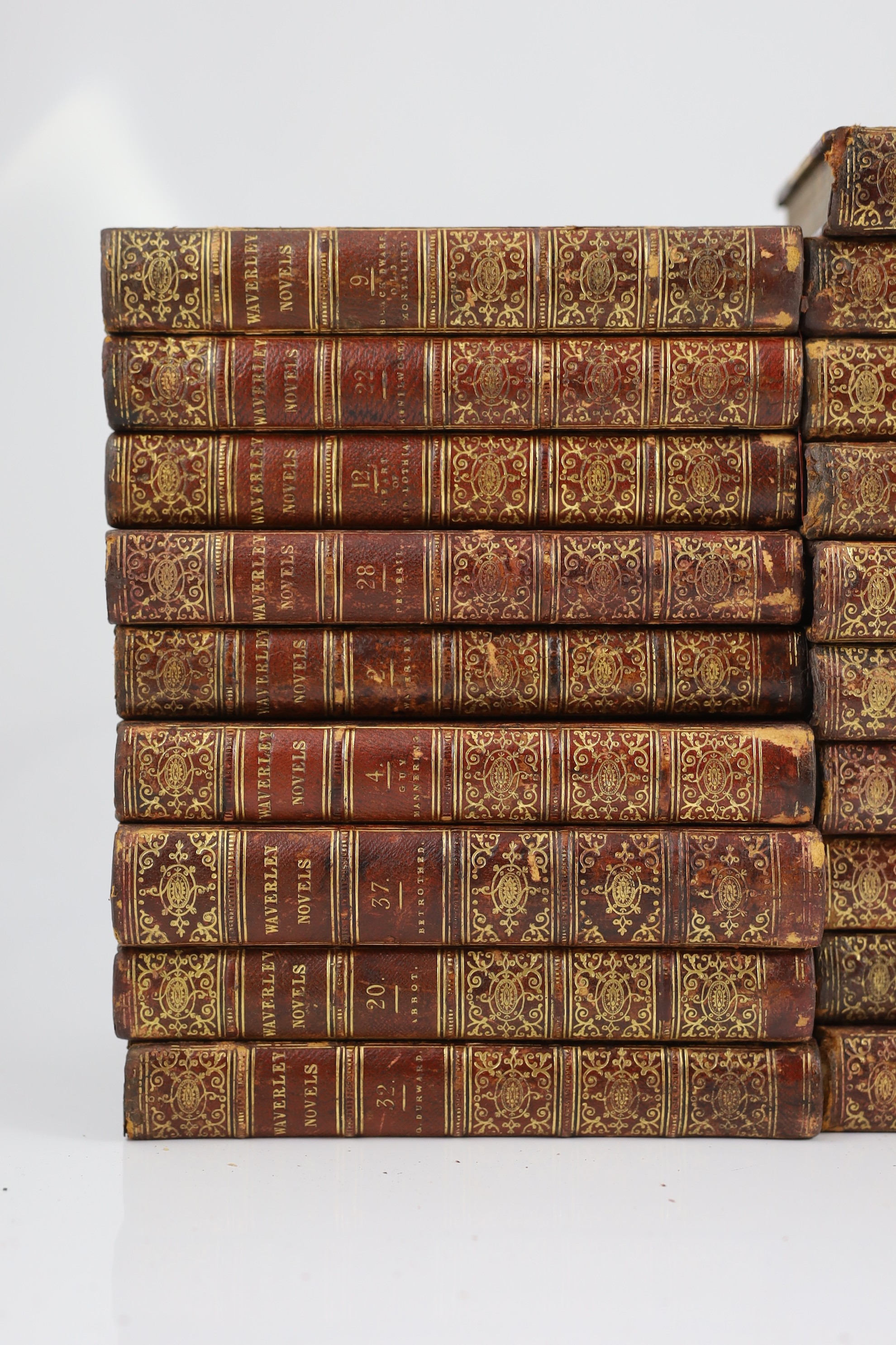 Scott, Sir Walker - Waverley Novels, 48 vols., engraved pictorial and printed titles, frontispieces; contemp. gilt-decorated maroon half morocco and marbled boards with panelled spines, marbled edges and e/ps., sm.8vo. E